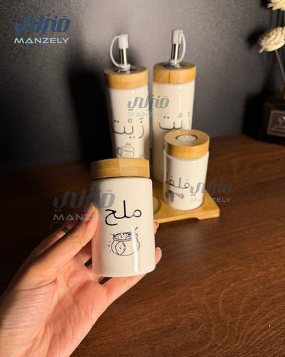 طقم زيت وملاحه بورسلين بغطاء خشب بامبو2*1
